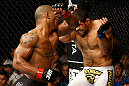 GOLD COAST, AUSTRALIA - DECEMBER 15:  (L-R) Hector Lombard punches Rousimar Palhares during their middleweight fight at the UFC on FX event on December 15, 2012  at Gold Coast Convention and Exhibition Centre in Gold Coast, Australia.  (Photo by Josh Hedges/Zuffa LLC/Zuffa LLC via Getty Images)