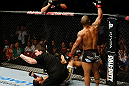 GOLD COAST, AUSTRALIA - DECEMBER 15:  Hector Lombard reacts after knocking out Rousimar Palhares during their middleweight fight at the UFC on FX event on December 15, 2012  at Gold Coast Convention and Exhibition Centre in Gold Coast, Australia.  (Photo by Josh Hedges/Zuffa LLC/Zuffa LLC via Getty Images)