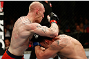 GOLD COAST, AUSTRALIA - DECEMBER 15:  (L-R) Colin Fletcher delivers an elbow strike against Norman Parke during their lightweight fight at the UFC on FX event on December 15, 2012  at Gold Coast Convention and Exhibition Centre in Gold Coast, Australia.  (Photo by Josh Hedges/Zuffa LLC/Zuffa LLC via Getty Images)