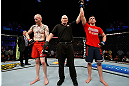GOLD COAST, AUSTRALIA - DECEMBER 15:  Norman Parke (R) reacts after defeating Colin Fletcher during their lightweight fight at the UFC on FX event on December 15, 2012  at Gold Coast Convention and Exhibition Centre in Gold Coast, Australia.  (Photo by Josh Hedges/Zuffa LLC/Zuffa LLC via Getty Images)
