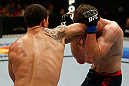 GOLD COAST, AUSTRALIA - DECEMBER 15:  (L-R) Robert Whittaker elbows Bradley Scott during their welterweight fight at the UFC on FX event on December 15, 2012  at Gold Coast Convention and Exhibition Centre in Gold Coast, Australia.  (Photo by Josh Hedges/Zuffa LLC/Zuffa LLC via Getty Images)