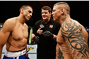GOLD COAST, AUSTRALIA - DECEMBER 15:  (L-R) Opponents George Sotiropoulos and Ross Pearson face off before their lightweight fight at the UFC on FX event on December 15, 2012  at Gold Coast Convention and Exhibition Centre in Gold Coast, Australia.  (Photo by Josh Hedges/Zuffa LLC/Zuffa LLC via Getty Images)
