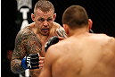 GOLD COAST, AUSTRALIA - DECEMBER 15:  (L-R) Ross Pearson squares off with George Sotiropoulos during their lightweight fight at the UFC on FX event on December 15, 2012  at Gold Coast Convention and Exhibition Centre in Gold Coast, Australia.  (Photo by Josh Hedges/Zuffa LLC/Zuffa LLC via Getty Images)