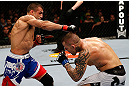 GOLD COAST, AUSTRALIA - DECEMBER 15:  (L-R) George Sotiropoulos punches Ross Pearson during their lightweight fight at the UFC on FX event on December 15, 2012  at Gold Coast Convention and Exhibition Centre in Gold Coast, Australia.  (Photo by Josh Hedges/Zuffa LLC/Zuffa LLC via Getty Images)