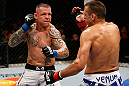 GOLD COAST, AUSTRALIA - DECEMBER 15:  (L-R) Ross Pearson punches George Sotiropoulos during their lightweight fight at the UFC on FX event on December 15, 2012  at Gold Coast Convention and Exhibition Centre in Gold Coast, Australia.  (Photo by Josh Hedges/Zuffa LLC/Zuffa LLC via Getty Images)