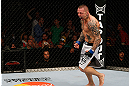 GOLD COAST, AUSTRALIA - DECEMBER 15:  Ross Pearson reacts after his knockout victory over George Sotiropoulos during their lightweight fight at the UFC on FX event on December 15, 2012  at Gold Coast Convention and Exhibition Centre in Gold Coast, Australia.  (Photo by Josh Hedges/Zuffa LLC/Zuffa LLC via Getty Images)
