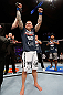GOLD COAST, AUSTRALIA - DECEMBER 15:  Ross Pearson reacts after his knockout victory over George Sotiropoulos during their lightweight fight at the UFC on FX event on December 15, 2012  at Gold Coast Convention and Exhibition Centre in Gold Coast, Australia.  (Photo by Josh Hedges/Zuffa LLC/Zuffa LLC via Getty Images)