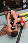 LAS VEGAS, NV - DECEMBER 15:  Mike Rio (top) punches John Cofer (bottom) during their lightweight fight at the TUF 16 Finale on December 15, 2012  at the Joint at the Hard Rock in Las Vegas, Nevada.  (Photo by Jim Kemper/Zuffa LLC/Zuffa LLC via Getty Images) *** Local Caption *** Mike Rio; John Cofer