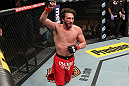 LAS VEGAS, NV - DECEMBER 15:  Mike Rio celebrates his submission victory over John Cofer after their lightweight fight at the TUF 16 Finale on December 15, 2012  at the Joint at the Hard Rock in Las Vegas, Nevada.  (Photo by Jim Kemper/Zuffa LLC/Zuffa LLC via Getty Images) *** Local Caption *** Mike Rio; John Cofer