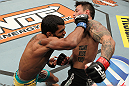 LAS VEGAS, NV - DECEMBER 15:  (L-R) Hugo Viana punches Reuben Duran during their bantamweight fight at the TUF 16 Finale on December 15, 2012  at the Joint at the Hard Rock in Las Vegas, Nevada.  (Photo by Jim Kemper/Zuffa LLC/Zuffa LLC via Getty Images) *** Local Caption *** Hugo Viana; Reuben Duran