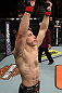 LAS VEGAS, NV - DECEMBER 15:  T.J. Waldburger reacts to his submission victory over Nick Catone after their welterweight fight at the TUF 16 Finale on December 15, 2012  at the Joint at the Hard Rock in Las Vegas, Nevada.  (Photo by Jim Kemper/Zuffa LLC/Zuffa LLC via Getty Images) *** Local Caption *** T.J. Waldburger; Nick Catone