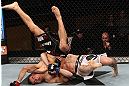 LAS VEGAS, NV - DECEMBER 15:  Rustam Khabilov (white shorts) slams Vinc Pichel during their lightweight fight at the TUF 16 Finale on December 15, 2012  at the Joint at the Hard Rock in Las Vegas, Nevada.  (Photo by Jim Kemper/Zuffa LLC/Zuffa LLC via Getty Images) *** Local Caption *** Vinc Pichel; Rustam Khabilov