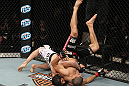 LAS VEGAS, NV - DECEMBER 15:  (L-R) Rustam Khabilov slams Vinc Pichel during their lightweight fight at the TUF 16 Finale on December 15, 2012  at the Joint at the Hard Rock in Las Vegas, Nevada.  (Photo by Jim Kemper/Zuffa LLC/Zuffa LLC via Getty Images) *** Local Caption *** Vinc Pichel; Rustam Khabilov