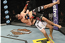 LAS VEGAS, NV - DECEMBER 15:  Rustam Khabilov (white shorts) slams Vinc Pichel during their lightweight fight at the TUF 16 Finale on December 15, 2012  at the Joint at the Hard Rock in Las Vegas, Nevada.  (Photo by Jim Kemper/Zuffa LLC/Zuffa LLC via Getty Images) *** Local Caption *** Vinc Pichel; Rustam Khabilov