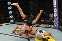 LAS VEGAS, NV - DECEMBER 15:  Rustam Khabilov (white shorts) slams Vinc Pichel during their lightweight fight at the TUF 16 Finale on December 15, 2012  at the Joint at the Hard Rock in Las Vegas, Nevada.  (Photo by Jim Kemper/Zuffa LLC/Zuffa LLC via Getty Images) *** Local Caption *** Vinc Pichel; Rustam Khabilov