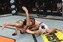 LAS VEGAS, NV - DECEMBER 15:  Rustam Khabilov (white shorts) slams Vinc Pichel during their lightweight fight at the TUF 16 Finale on December 15, 2012  at the Joint at the Hard Rock in Las Vegas, Nevada.  (Photo by Jim Kemper/Zuffa LLC/Zuffa LLC via Getty Images) *** Local Caption *** Vinc Pichel; Rustam Khabilov
