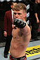 LAS VEGAS, NV - DECEMBER 15:  Mike Pyle reacts to his knockout victory over James Head during their welterweight fight at the TUF 16 Finale on December 15, 2012  at the Joint at the Hard Rock in Las Vegas, Nevada.  (Photo by Jim Kemper/Zuffa LLC/Zuffa LLC via Getty Images) *** Local Caption *** Mike Pyle; James Head