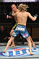 LAS VEGAS, NV - DECEMBER 15:  Dustin Poirier (black shorts) and Jonathan Poirier (blue shorts) exchange punches during their featherweight fight at the TUF 16 Finale on December 15, 2012  at the Joint at the Hard Rock in Las Vegas, Nevada.  (Photo by Jim Kemper/Zuffa LLC/Zuffa LLC via Getty Images) *** Local Caption *** Dustn Poirier; Jonathan Brookins