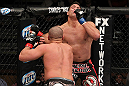LAS VEGAS, NV - DECEMBER 15:  (L-R) Pat Barry punches Shane Del Rosario during their heavyweight fight at the TUF 16 Finale on December 15, 2012  at the Joint at the Hard Rock in Las Vegas, Nevada.  (Photo by Jim Kemper/Zuffa LLC/Zuffa LLC via Getty Images) *** Local Caption *** Pat Barry; Shane Del Rosario