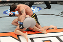 LAS VEGAS, NV - DECEMBER 15:  Mike Ricci (top) elbows Colton Smith (bottom) during their lightweight fight at the TUF 16 Finale on December 15, 2012  at the Joint at the Hard Rock in Las Vegas, Nevada.  (Photo by Jim Kemper/Zuffa LLC/Zuffa LLC via Getty Images) *** Local Caption *** Colton Smith; Mike Ricci