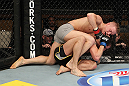 LAS VEGAS, NV - DECEMBER 15:  Colton Smith (grey shorts) attempts to submit Mike Ricci during their lightweight fight at the TUF 16 Finale on December 15, 2012  at the Joint at the Hard Rock in Las Vegas, Nevada.  (Photo by Jim Kemper/Zuffa LLC/Zuffa LLC via Getty Images) *** Local Caption *** Colton Smith; Mike Ricci