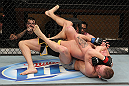 LAS VEGAS, NV - DECEMBER 15:  Colton Smith (bottom) attempts to submit Mike Ricci during their lightweight fight at the TUF 16 Finale on December 15, 2012  at the Joint at the Hard Rock in Las Vegas, Nevada.  (Photo by Jim Kemper/Zuffa LLC/Zuffa LLC via Getty Images) *** Local Caption *** Colton Smith; Mike Ricci