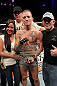 LAS VEGAS, NV - DECEMBER 15:  Colton Smith (center) with family members after his lightweight fight at the TUF 16 Finale on December 15, 2012  at the Joint at the Hard Rock in Las Vegas, Nevada.  (Photo by Jim Kemper/Zuffa LLC/Zuffa LLC via Getty Images) *** Local Caption *** Colton Smith; Mike Ricci