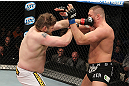 LAS VEGAS, NV - DECEMBER 15:  (L-R) Roy Nelson punches Matt Mitrione during their heavyweight fight at the TUF 16 Finale on December 15, 2012  at the Joint at the Hard Rock in Las Vegas, Nevada.  (Photo by Jim Kemper/Zuffa LLC/Zuffa LLC via Getty Images) *** Local Caption *** Roy Nelson; Matt Mitrione