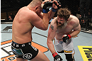 LAS VEGAS, NV - DECEMBER 15:  (R-L) Roy Nelson punches Matt Mitrione during their heavyweight fight at the TUF 16 Finale on December 15, 2012  at the Joint at the Hard Rock in Las Vegas, Nevada.  (Photo by Jim Kemper/Zuffa LLC/Zuffa LLC via Getty Images) *** Local Caption *** Roy Nelson; Matt Mitrione