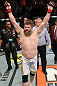 LAS VEGAS, NV - DECEMBER 15:  Roy Nelson reacts to his knockout victory over Matt Mitrione after their heavyweight fight at the TUF 16 Finale on December 15, 2012  at the Joint at the Hard Rock in Las Vegas, Nevada.  (Photo by Jim Kemper/Zuffa LLC/Zuffa LLC via Getty Images) *** Local Caption *** Roy Nelson; Shane Carwin