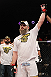 LAS VEGAS, NV - DECEMBER 15:  Roy Nelson reacts to being declared the winner over Matt Mitrione during their heavyweight fight at the TUF 16 Finale on December 15, 2012  at the Joint at the Hard Rock in Las Vegas, Nevada.  (Photo by Jim Kemper/Zuffa LLC/Zuffa LLC via Getty Images) *** Local Caption *** Roy Nelson; Shane Carwin