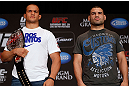 LAS VEGAS, NV - DECEMBER 27:  (L-R) Opponents Junior dos Santos and Cain Velasquez pose for photos during the final UFC 155 pre-fight press conference on December 27, 2012 at MGM Grand in Las Vegas, Nevada. (Photo by Josh Hedges/Zuffa LLC/Zuffa LLC via Getty Images)