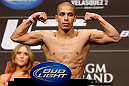 LAS VEGAS, NV - DECEMBER 28:  John Moraga flexes during the UFC 155 weigh-in on December 28, 2012 at MGM Grand Garden Arena in Las Vegas, Nevada. (Photo by Josh Hedges/Zuffa LLC/Zuffa LLC via Getty Images)