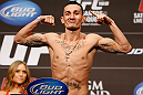 LAS VEGAS, NV - DECEMBER 28:  Max Holloway flexes during the UFC 155 weigh-in on December 28, 2012 at MGM Grand Garden Arena in Las Vegas, Nevada. (Photo by Josh Hedges/Zuffa LLC/Zuffa LLC via Getty Images)