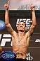 LAS VEGAS, NV - DECEMBER 28:  Max Holloway gestures during the UFC 155 weigh-in on December 28, 2012 at MGM Grand Garden Arena in Las Vegas, Nevada. (Photo by Josh Hedges/Zuffa LLC/Zuffa LLC via Getty Images)