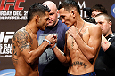 LAS VEGAS, NV - DECEMBER 28:  (L-R) Opponents Leonard Garcia and Max Holloway face off during the UFC 155 weigh-in on December 28, 2012 at MGM Grand Garden Arena in Las Vegas, Nevada. (Photo by Josh Hedges/Zuffa LLC/Zuffa LLC via Getty Images)