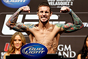 LAS VEGAS, NV - DECEMBER 28:  Eddie Wineland flexes during the UFC 155 weigh-in on December 28, 2012 at MGM Grand Garden Arena in Las Vegas, Nevada. (Photo by Josh Hedges/Zuffa LLC/Zuffa LLC via Getty Images)