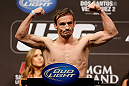 LAS VEGAS, NV - DECEMBER 28:  Brad Pickett flexes during the UFC 155 weigh-in on December 28, 2012 at MGM Grand Garden Arena in Las Vegas, Nevada. (Photo by Josh Hedges/Zuffa LLC/Zuffa LLC via Getty Images)