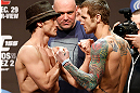 LAS VEGAS, NV - DECEMBER 28:  (L-R) Opponents Brad Pickett and Eddie Wineland face off during the UFC 155 weigh-in on December 28, 2012 at MGM Grand Garden Arena in Las Vegas, Nevada. (Photo by Josh Hedges/Zuffa LLC/Zuffa LLC via Getty Images)