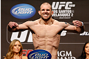 LAS VEGAS, NV - DECEMBER 28:  Alan Belcher flexes during the UFC 155 weigh-in on December 28, 2012 at MGM Grand Garden Arena in Las Vegas, Nevada. (Photo by Josh Hedges/Zuffa LLC/Zuffa LLC via Getty Images)