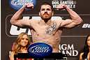 LAS VEGAS, NV - DECEMBER 28:  Jim Miller flexes during the UFC 155 weigh-in on December 28, 2012 at MGM Grand Garden Arena in Las Vegas, Nevada. (Photo by Josh Hedges/Zuffa LLC/Zuffa LLC via Getty Images)