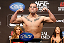 LAS VEGAS, NV - DECEMBER 28:  Cain Velasquez flexes during the UFC 155 weigh-in on December 28, 2012 at MGM Grand Garden Arena in Las Vegas, Nevada. (Photo by Josh Hedges/Zuffa LLC/Zuffa LLC via Getty Images)
