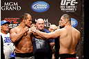 LAS VEGAS, NV - DECEMBER 28:  (L-R) UFC Heavyweight Champion Junior dos Santos faces off with challenger Cain Velasquez during the UFC 155 weigh-in on December 28, 2012 at MGM Grand Garden Arena in Las Vegas, Nevada. (Photo by Josh Hedges/Zuffa LLC/Zuffa LLC via Getty Images)