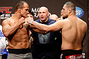 LAS VEGAS, NV - DECEMBER 28:  (L-R) UFC Heavyweight Champion Junior dos Santos faces off with challenger Cain Velasquez during the UFC 155 weigh-in on December 28, 2012 at MGM Grand Garden Arena in Las Vegas, Nevada. (Photo by Josh Hedges/Zuffa LLC/Zuffa LLC via Getty Images)