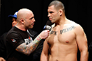 LAS VEGAS, NV - DECEMBER 28:  (R-L) UFC heavyweight title challenger Cain Velasquez is interviewed by Joe Rogan during the UFC 155 weigh-in on December 28, 2012 at MGM Grand Garden Arena in Las Vegas, Nevada. (Photo by Josh Hedges/Zuffa LLC/Zuffa LLC via Getty Images)