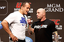 LAS VEGAS, NV - DECEMBER 28:  (L-R) UFC Heavyweight Champion Junior dos Santos is interviewed by Joe Rogan during the UFC 155 weigh-in on December 28, 2012 at MGM Grand Garden Arena in Las Vegas, Nevada. (Photo by Josh Hedges/Zuffa LLC/Zuffa LLC via Getty Images)