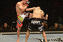 LAS VEGAS, NV - DECEMBER 29:  (L-R) Chris Cariaso kicks John Moraga during their flyweight fight at UFC 155 on December 29, 2012 at MGM Grand Garden Arena in Las Vegas, Nevada. (Photo by Donald Miralle/Zuffa LLC/Zuffa LLC via Getty Images) *** Local Caption *** Chris Cariaso; John Moraga