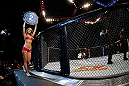 LAS VEGAS, NV - DECEMBER 29:  Octagon Girl Brittney Palmer announces round two of the Cariaso vs Moraga flyweight fight at UFC 155 on December 29, 2012 at MGM Grand Garden Arena in Las Vegas, Nevada. (Photo by Josh Hedges/Zuffa LLC/Zuffa LLC via Getty Images) *** Local Caption *** Brittney Palmer