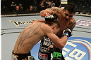 LAS VEGAS, NV - DECEMBER 29:  (R-L) Leonard Garcia punches Max Holloway during their featherweight fight at UFC 155 on December 29, 2012 at MGM Grand Garden Arena in Las Vegas, Nevada. (Photo by Donald Miralle/Zuffa LLC/Zuffa LLC via Getty Images) *** Local Caption *** Leonard Garcia; Max Holloway