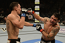 LAS VEGAS, NV - DECEMBER 29:  (R-L) Leonard Garcia punches Max Holloway during their featherweight fight at UFC 155 on December 29, 2012 at MGM Grand Garden Arena in Las Vegas, Nevada. (Photo by Donald Miralle/Zuffa LLC/Zuffa LLC via Getty Images) *** Local Caption *** Leonard Garcia; Max Holloway